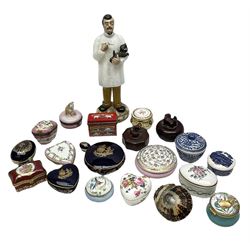 Collection of assorted porcelain and enamel boxes, to include two Bilston enamel examples, a number by Limoges, and various other makers, plus a glass model of a vet holding a dog, etc., in one box 