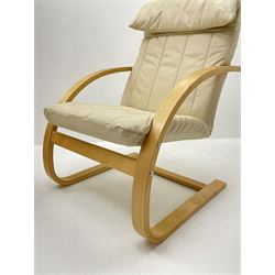 Pair lightwood cantilever easy chairs upholstered in cream leather
