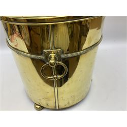 Cylindrical brass coal bucket with lid, raised on three feet, urn finial, H54cm