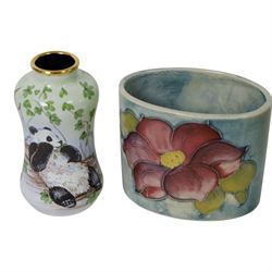 Moorcroft enamel vase, decorated with pandas, in box together with a small Moorcroft vase clematis pattern, enamel vase H8cm