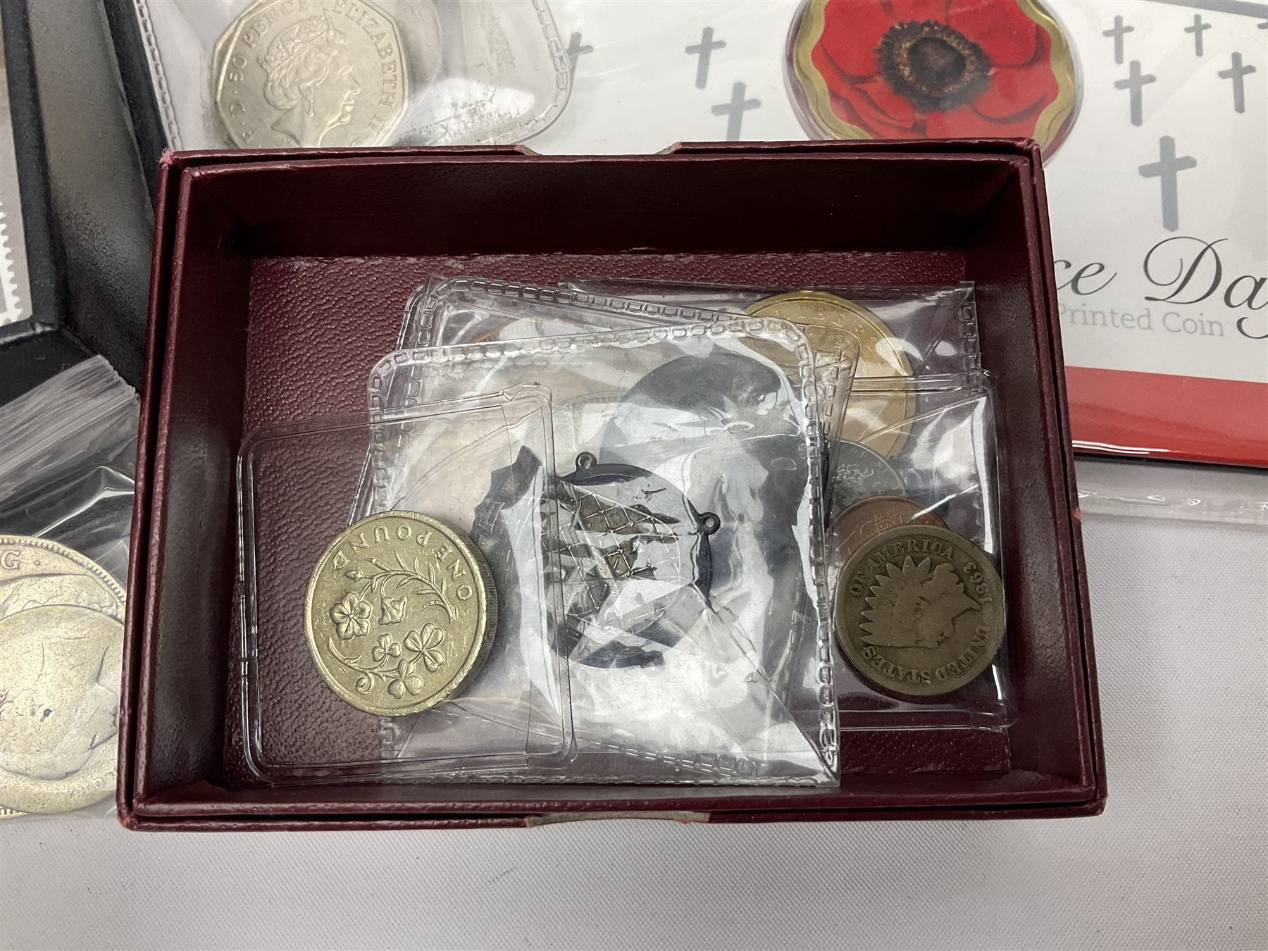 Commemorative and other coinage, including various Queen Elizabeth II 'London 2012 sports collection' fifty pence coins on cards, commemorative crowns, Millennium 2000 'Time Capsule' coin set, channel islands old round one pound coins, part sets etc