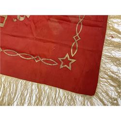 1970s Soviet banner printed in gold on a red ground, roughly translates as 'Transferable Banner - To the winner in the Socialist Competition' and 'Work Study Live by Communism' verso; wreath of wheat ears to either side; tassels on three sides 110 x 155cm