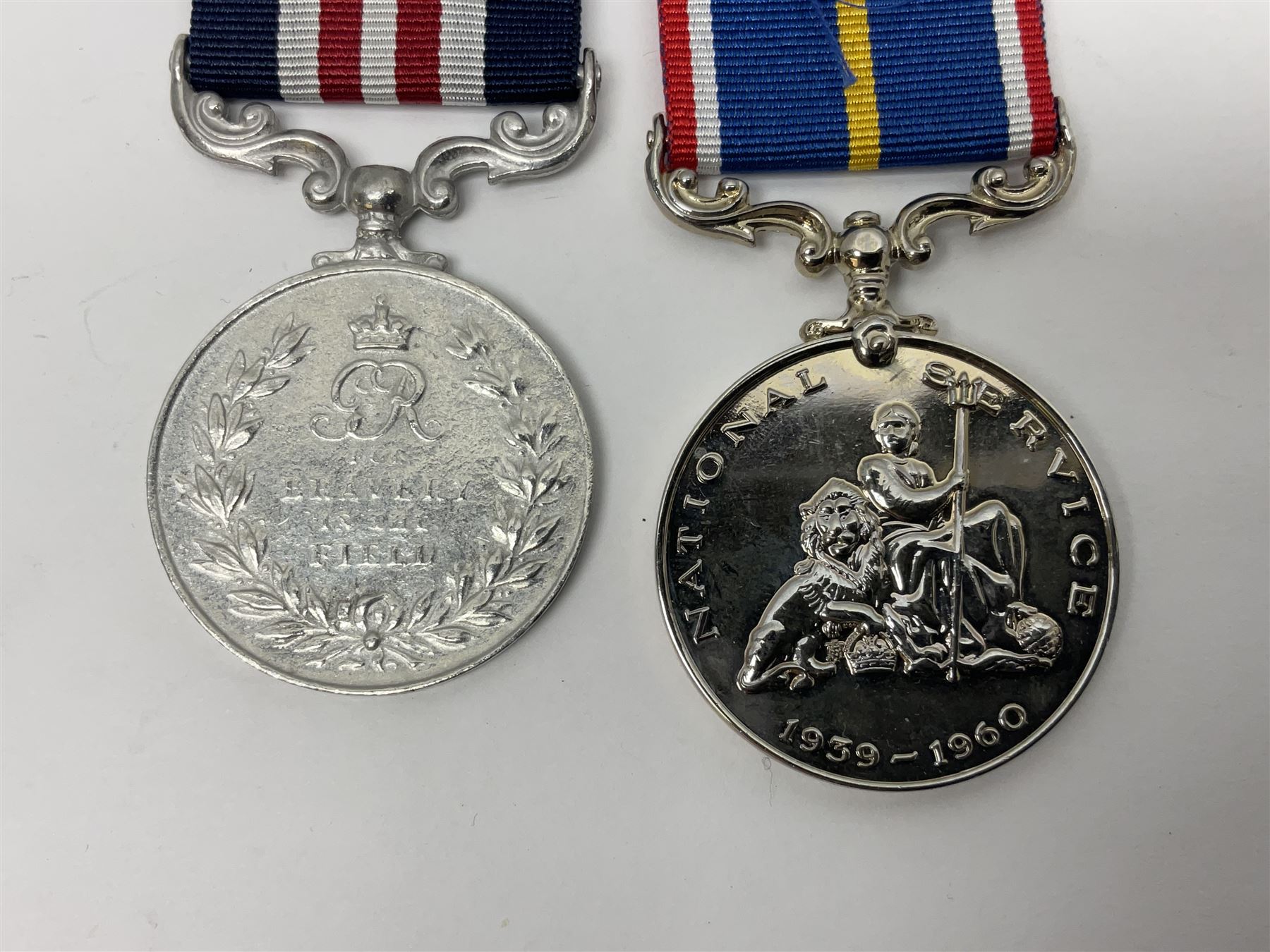 Gaunt & Son Territorial Force Nursing Service cape medal; cased; WW1 British War Medal and 1914-15 Star (names erased); two MID oak leaves; Polish and American medals; eight replica medals including VC, MM, Air Crew Europe Star etc and replica group of five WW2 miniatures etc