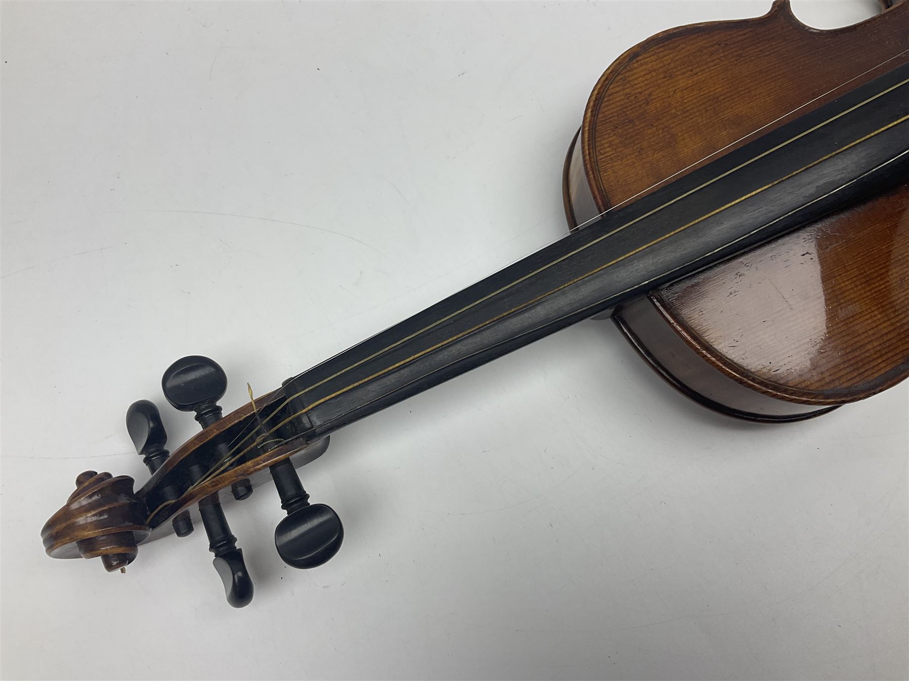 German trade violin c1900 with 35.5cm two-piece maple back and spruce top; bears label 'Made in Germany Apollo Class 6 No.2132' L59cm; in carrying case with two bows