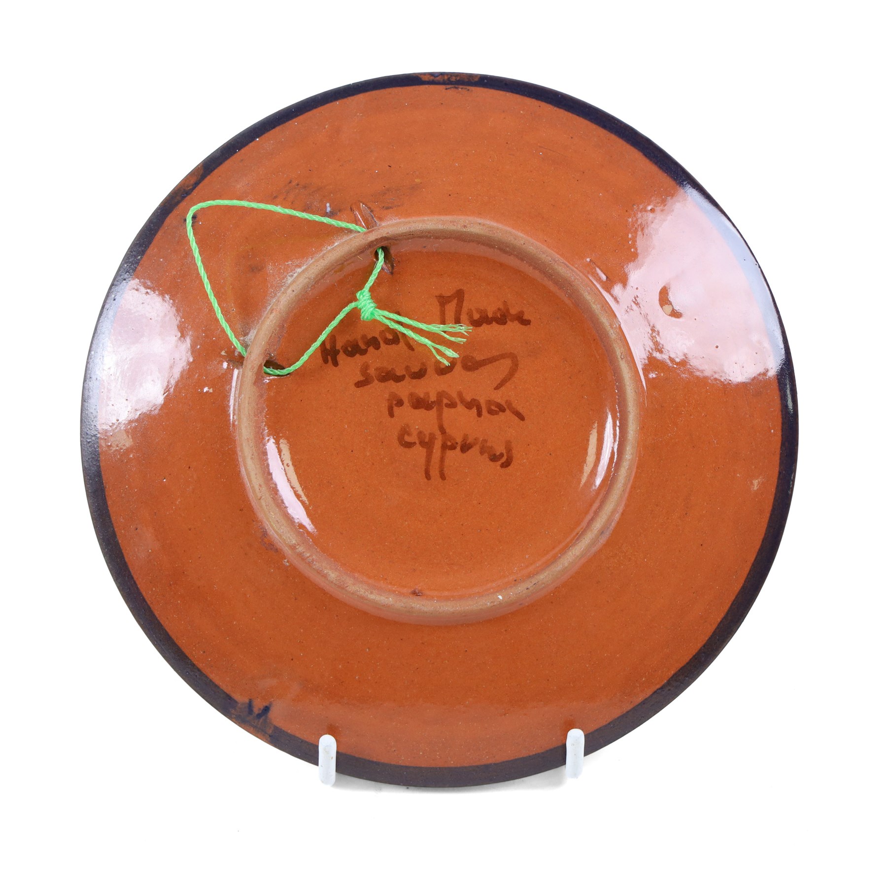 Large mid-20th century Spanish Puigdemont studio pottery charger, depicting a stylised fish, together with three other plates decorated with fish 