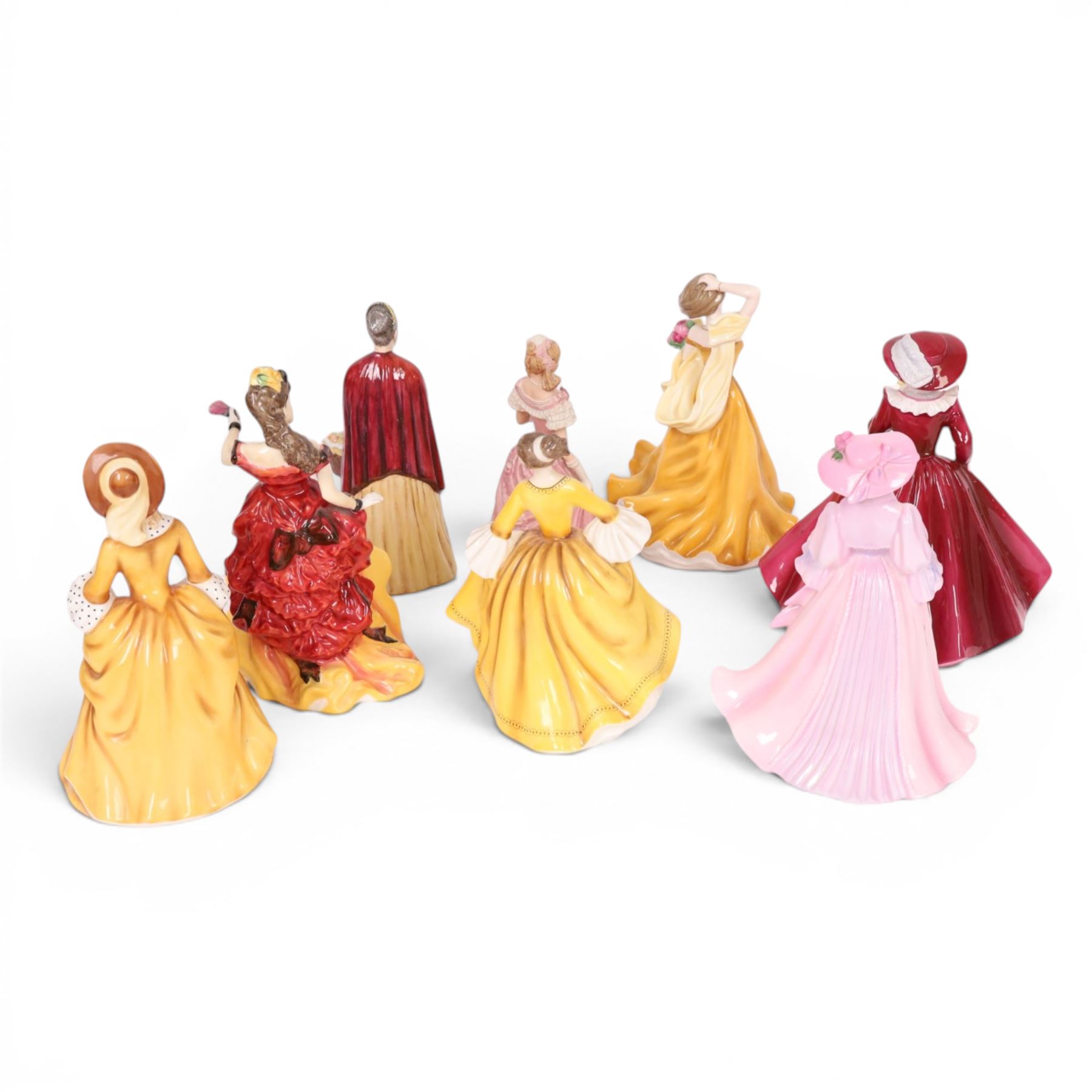 Four Royal Doulton figures, comprising Belle, Joanna, Sandra and Stephanie, together with four other figures 