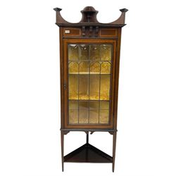 Edwardian inlaid mahogany corner cabinet, fitted with single astragal glazed door enclosing two shelves, flanked by satinwood banding, on square tapering supports united by undertier