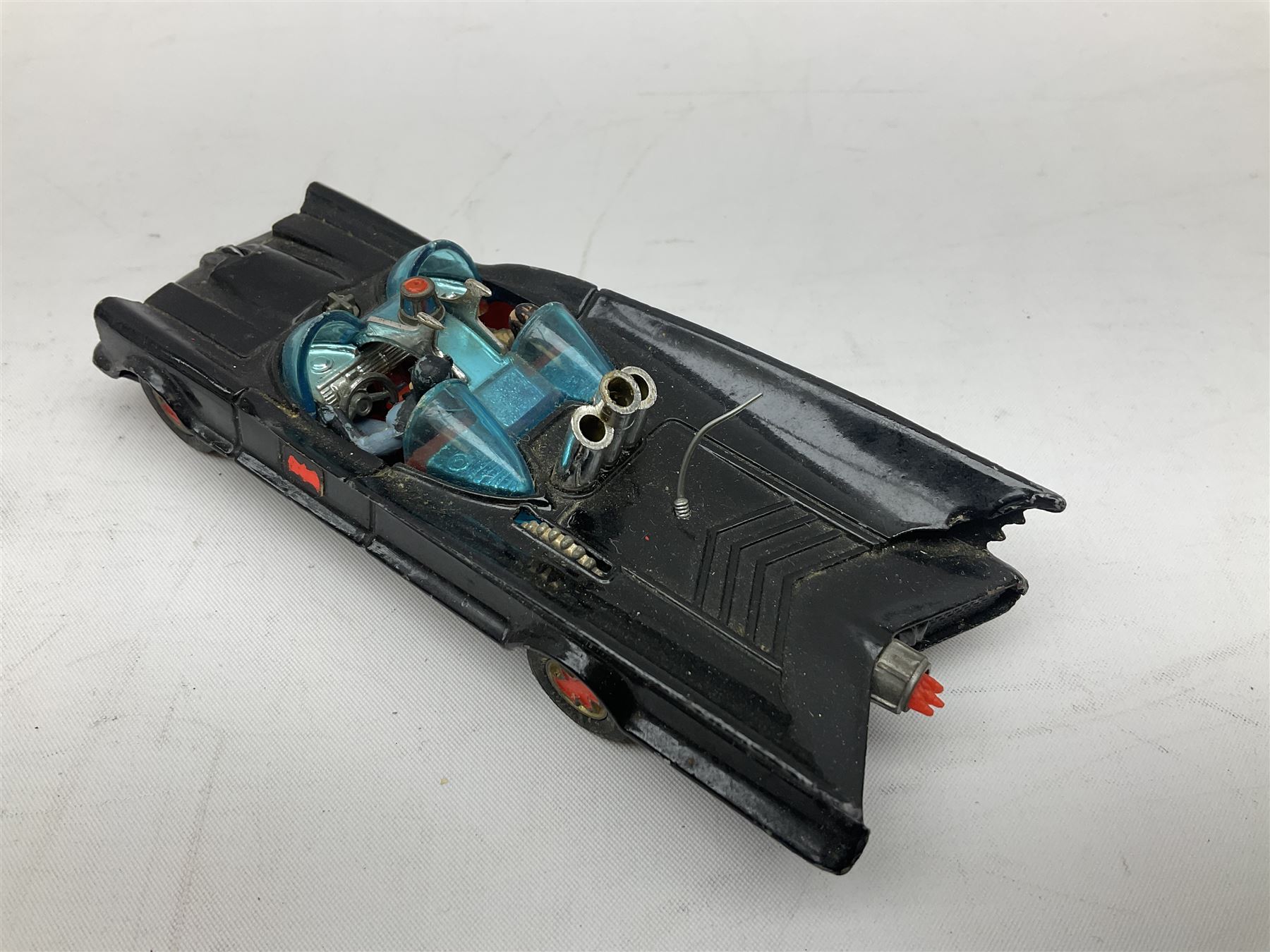 Twenty unboxed and playworn die-cast models including Dinky Guy van Golden Shred, Buick Riviera, Austin A105, Hillman Imp etc; Corgi Batmobile, Monkeemobile, Man From Uncle Oldsmobile Super 88, Airborne Caravan, Ford Mustang etc; Spot-On Humber Super Snipe Estate car; Schuco Micro Racer 1038 clockwork Mercedes 220S etc