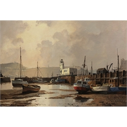 Don Micklethwaite (British 1936-): Scarborough Harbour at Low Tide, oil on board signed 34cm x 49cm