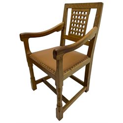 Rabbitman - set of six (4+2) oak dining chairs, carved and pierced lattice back, tan leather upholstered seat with stud band, on octagonal supports united by H-stretchers, carved with rabbit signature, by Peter Heap, Wetwang 