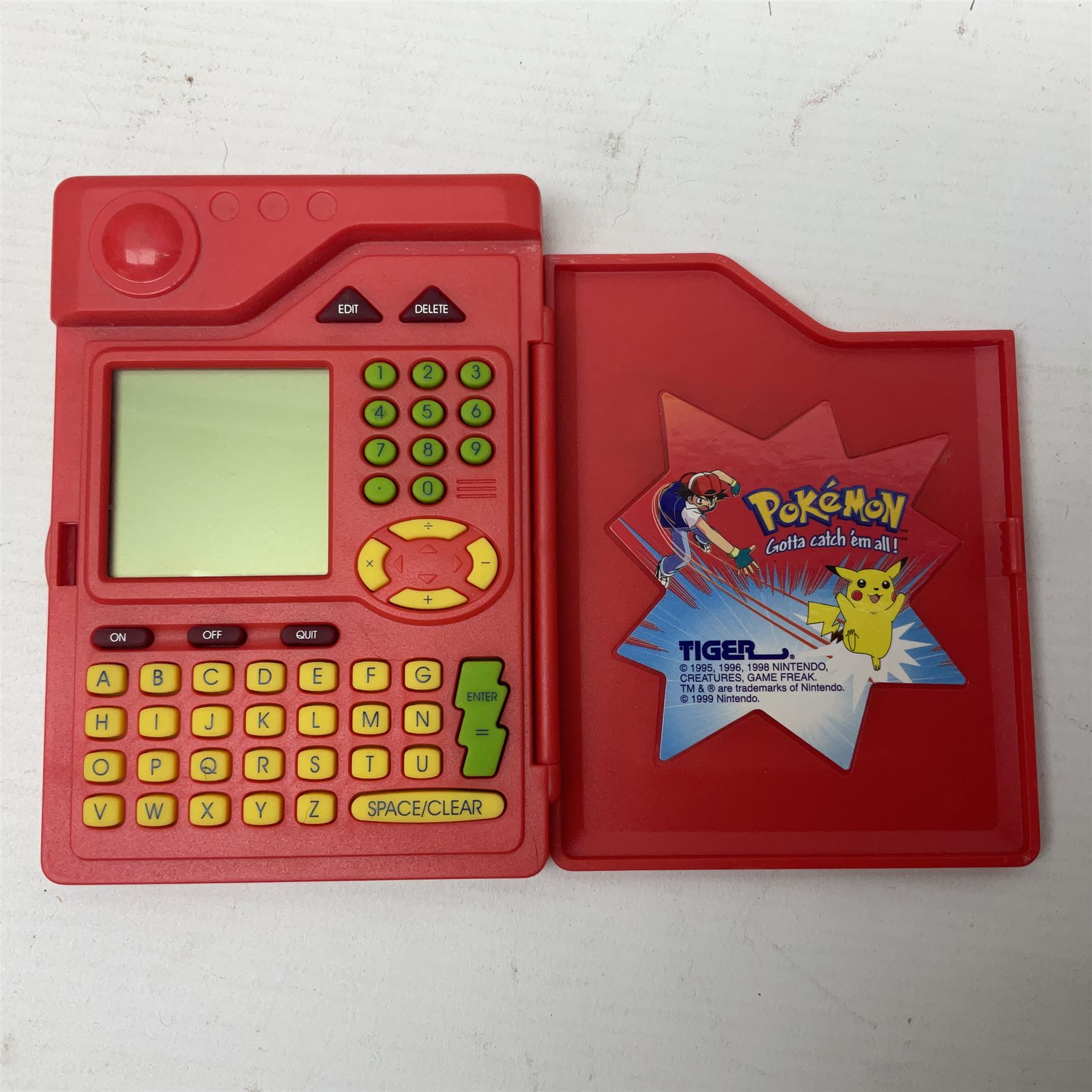 Collection of Pokemon trading cards, mostly 1999 Wizards Pokemon cards to include holo Charizard 4/102, first edition holo Machamp 8/102, further holographic cards; Dark Flareon 35/82 and Dark Vaporeon 45/82, cards from themed sets and 4th edition prints; 1998 Electronic Pokédex with cardboard boxes for themed decks Blackout, Overgrowth and Power Reserve Jungle, along with a large quantity of energy and trainer cards 