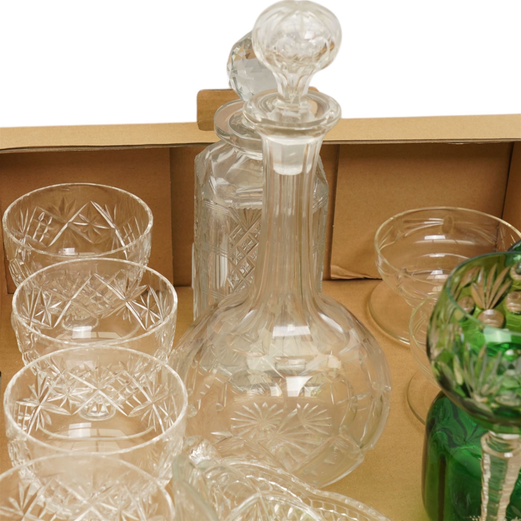 Large collection of glass, including amber stem sherry/liqueur glasses with leaf decoration to rims, green glass examples, decanters etc