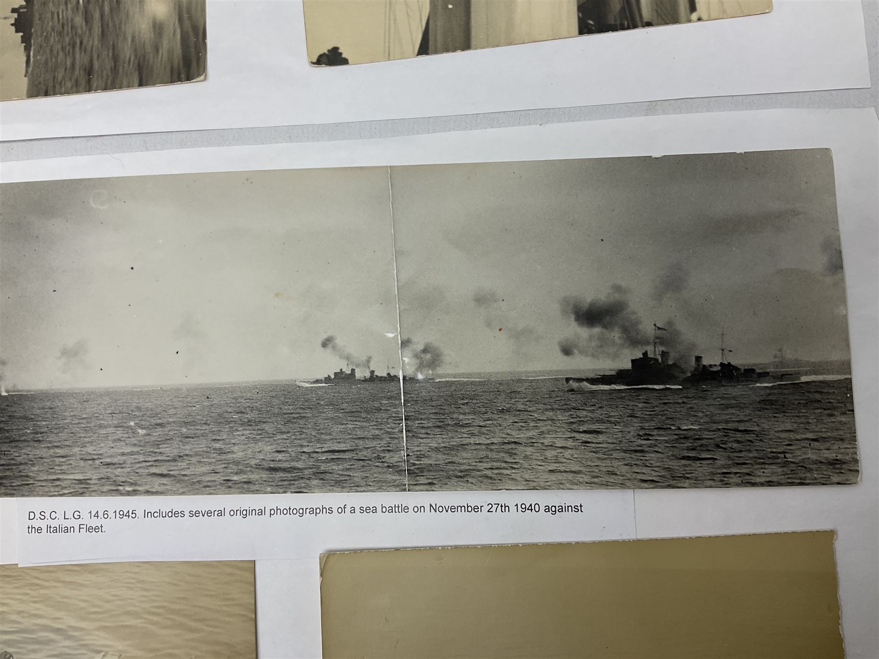 WW2 Royal Naval group of eight medals comprising OBE, hallmarked silver Distinguished Service Cross inscribed verso Lieut. J.R. McCluskie RNVR 1945, 1939-1945 Star, Atlantic Star, Africa Star, 1939-1945 War Medal, Defence Medal and Royal Naval Patrol Service Medal inscribed Lieutenant J.R. McCluskie Royal Naval Patrol Service; with seven original photographs of a sea battle 27th November 1940 against the Italian Fleet and another photographic postcard of Sir Stafford Cripps arriving on board one of the vessels.