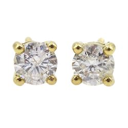 Pair of 18ct gold round brilliant cut diamond stud earrings, stamped 750, total diamond weight 0.64 carat