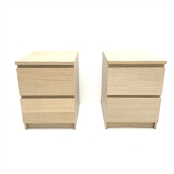 Pair Ikea light oak bedside chests, two drawers, plinth base, W41cm, H55cm, D49cm