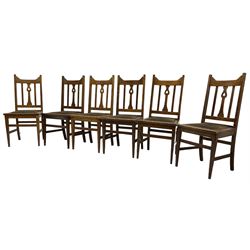 Set of six early 20th century oak dining chairs, shaped and heart pierced vertical splat, on square tapering front supports 
