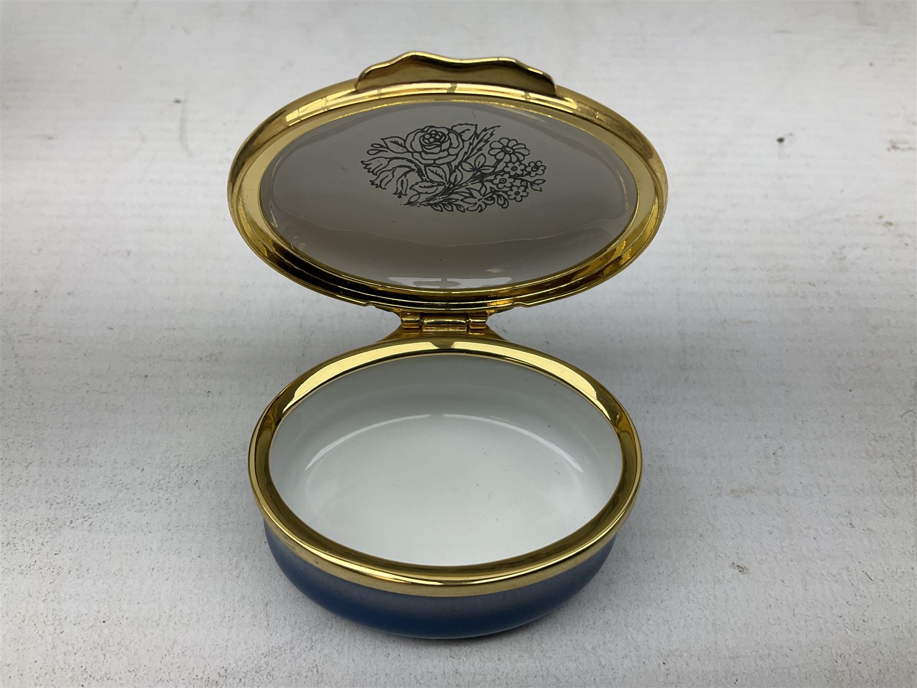 Group of seven Halcyon Days enamel boxes, each with affectionate inscriptions, including 'Wild about you', 'Don't ever change', 'Love you a bunch', etc., in six fitted boxes  