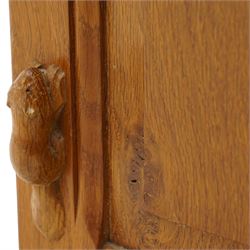 Beaverman - oak media stand, rectangular top over panelled hinged front fitted with Yorkshire rose carved handles, on moulded skirt base, carved with beaver signature, by Colin Almack, Sutton-under-Whitestone Cliffe, Thirsk