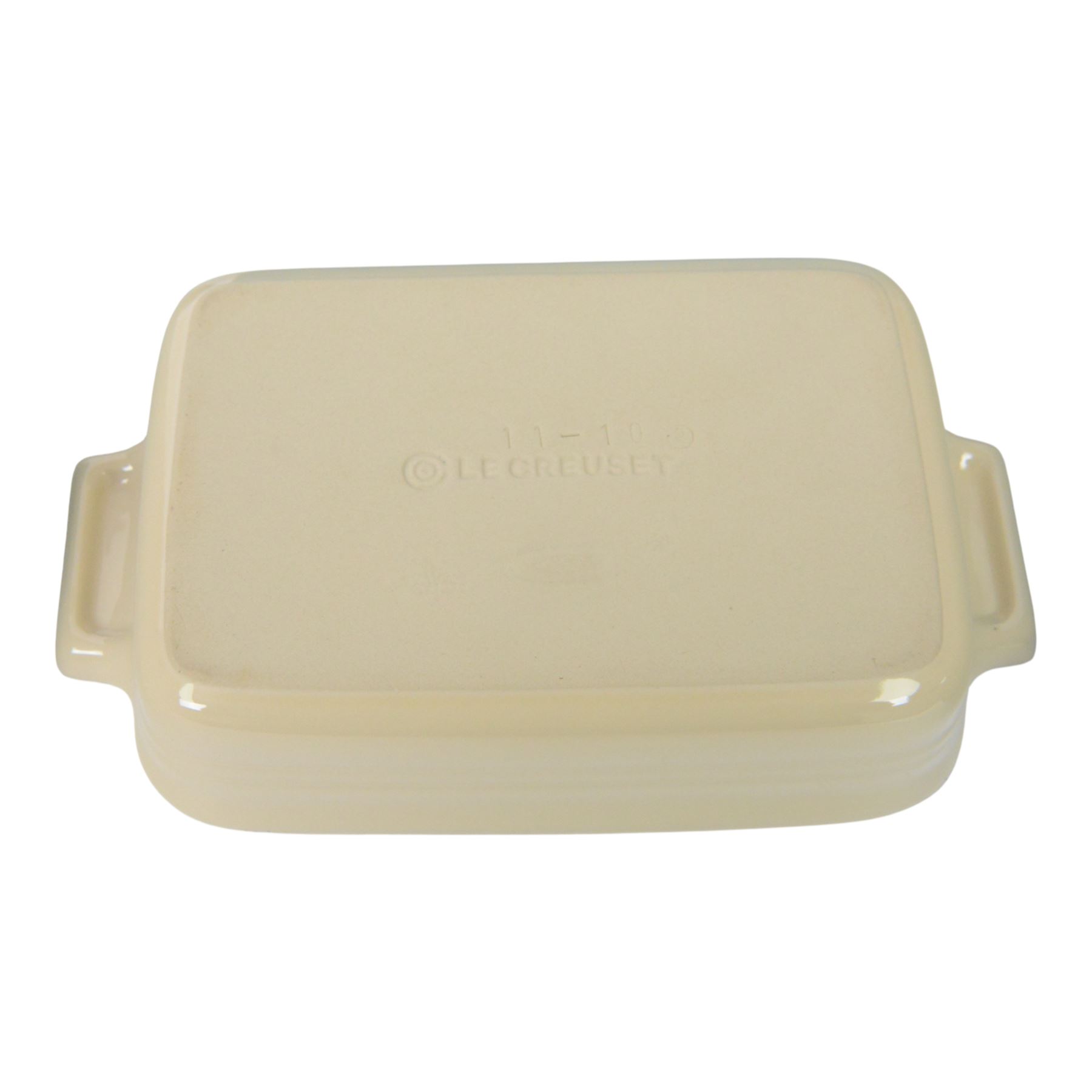 Le Creuset ceramic kitchen wares in cream and light blue, including pie dishes, baking dishes, petit casseroles etc  