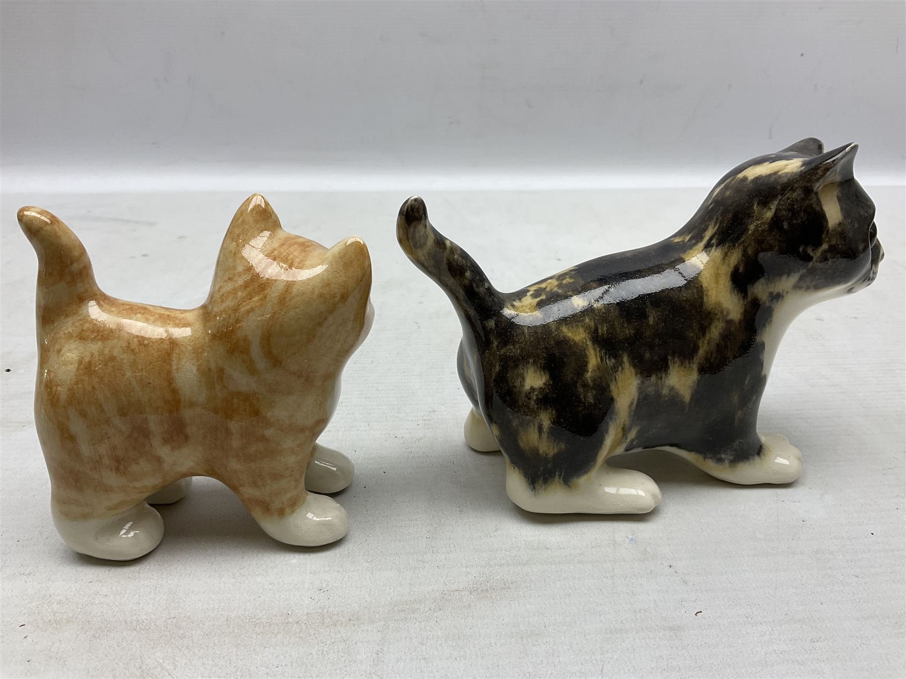 Two Winstanley figures of kittens, comprising tabby cat no 2 and ginger cat no 1, both with inset eyes and painted marks beneath, tallest H11cm