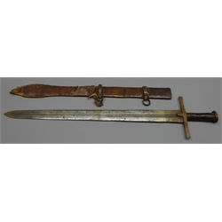  Sudanese Kaskara Sword , 65cm broad double edged fullered blade engraved opposing moons, leather bound wooden grip and iron cross guard, in leather scabbard, L77.5cm  