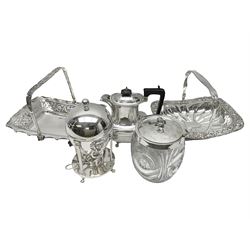 Edwardian silver plated swing handled basket, with pierced sides, engraved May 18 1904, with engraved initial A to handle, upon four ball and claw feet, together with other silver plated item including a similar swing handled basket, with embossed floral border, upon a rectangular pedestal, an egg coddler, with lion mask handles, hot water pot and a moulded glass biscuit barrel, coddler H22cm