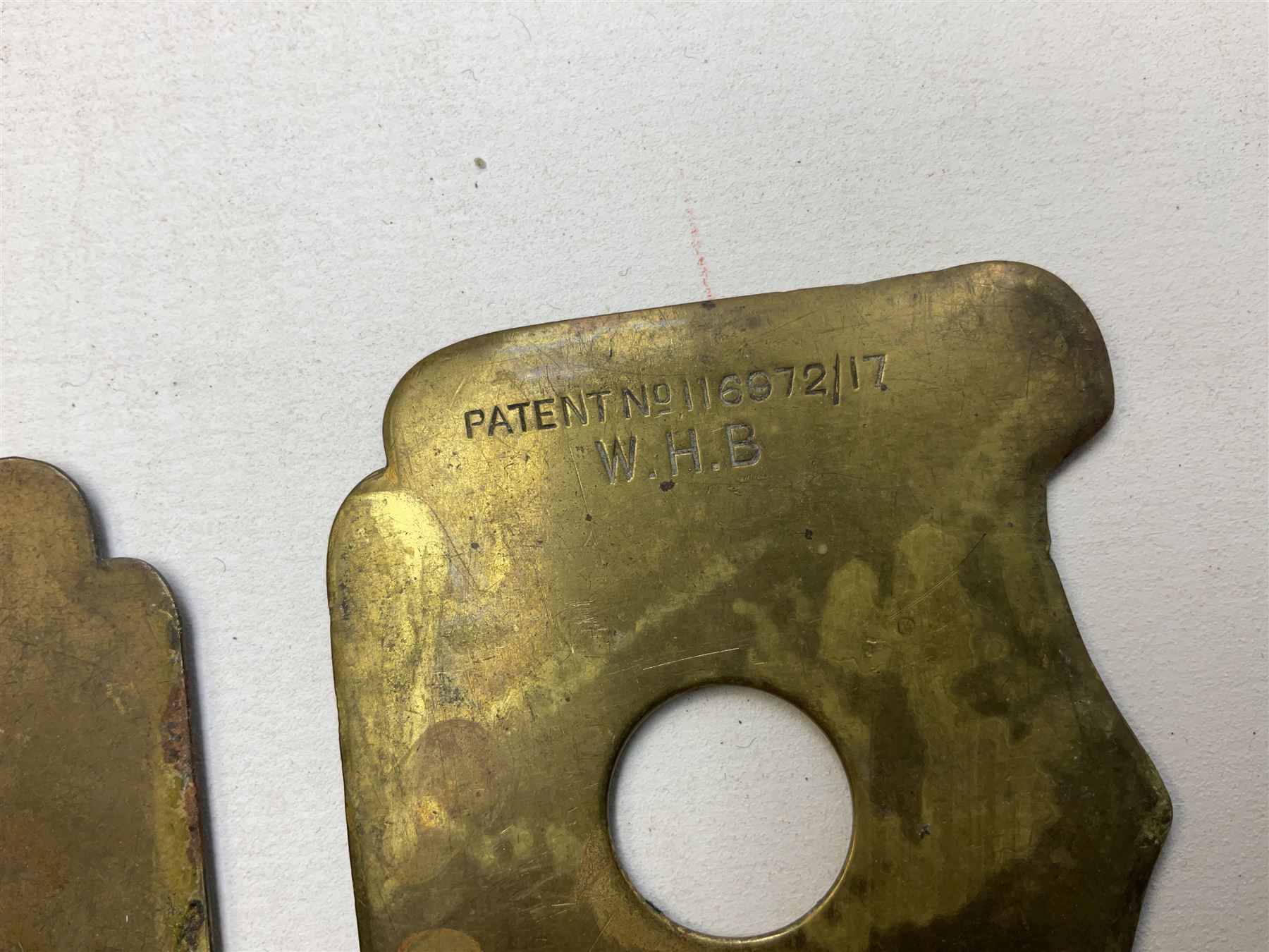 Three war department brass uniform protector button polisher, one marked 650097