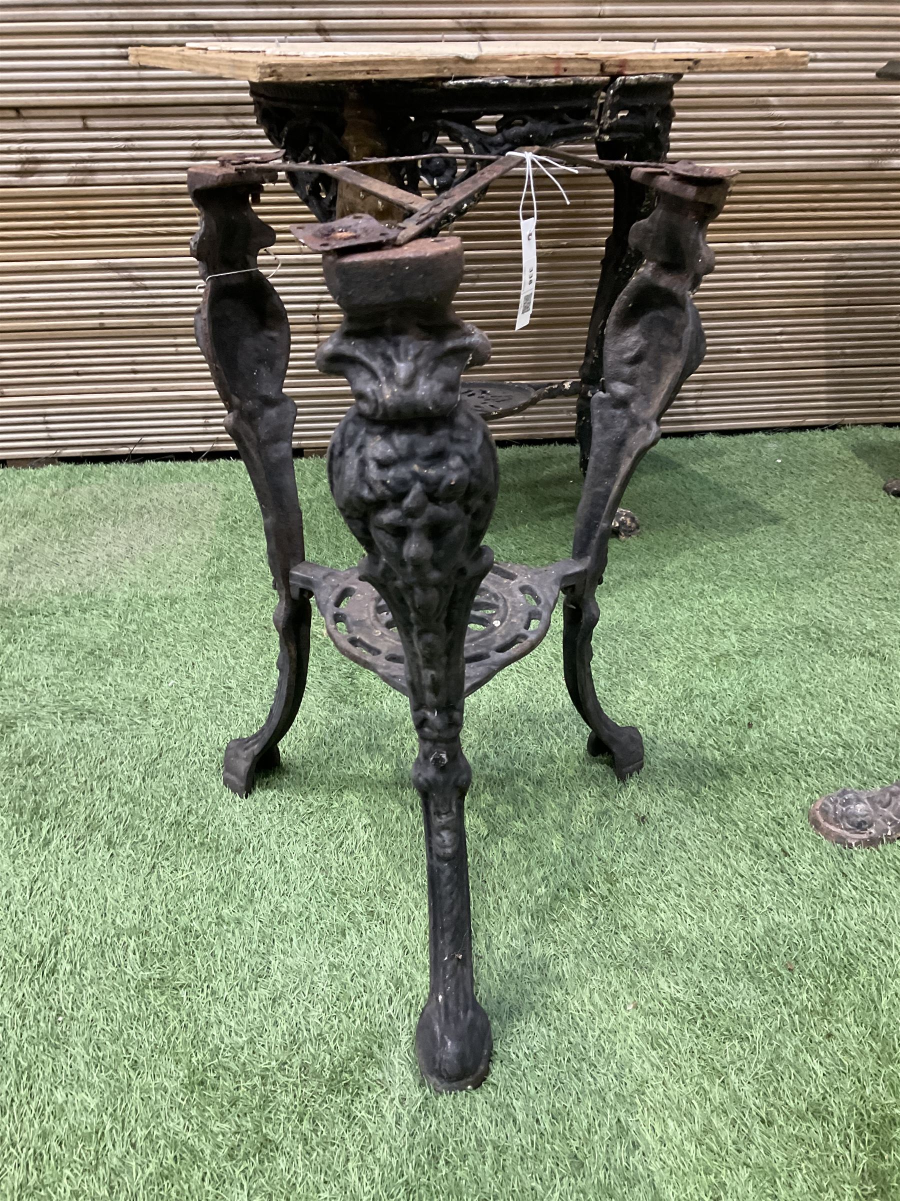 Britannia cast iron pub table, an ornate cast iron rectangular pub table, and three cast iron table bases (5) - THIS LOT IS TO BE COLLECTED BY APPOINTMENT FROM DUGGLEBY STORAGE, GREAT HILL, EASTFIELD, SCARBOROUGH, YO11 3TX