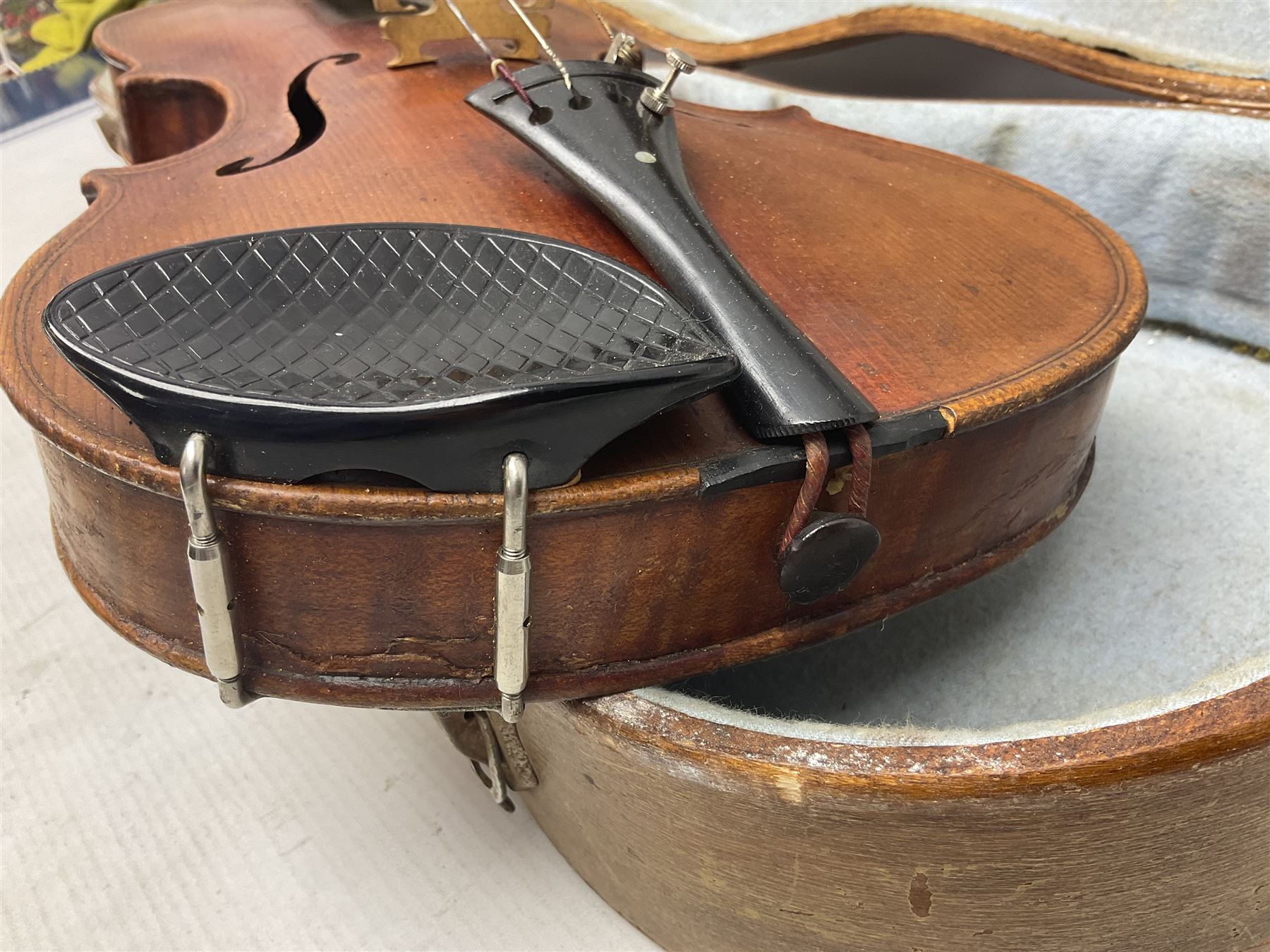 Mid-19th century German violin with 36cm two-piece maple back and ribs and spruce top, bears label 'Riccardo Antoniazzi Cremonese fece in Milano l'anno 1896' L59.5cm overall; in walnut case with two part bows