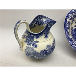 Mintons Genevese pattern wash bowl, jug and toothbrush holder, together with a similar Mintons blue and white soap dish, all decorated in the oriental style, all with printed marks beneath, largest D32cm