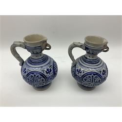 Pair of late 19th Century German Simon Peter Gerz salt glaze stone jugs, impressed mark to base, model number 550, H15cm