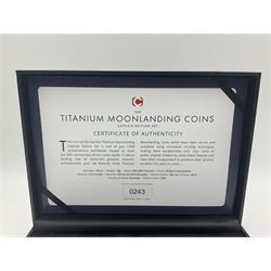 Queen Elizabeth II Bailiwick of Guernsey 2019 'The Titanium Moonlanding' fifty pence three coin set, comprising 'Green', 'Orange' and 'Blue' titanium coins, in capsules and case with certificate