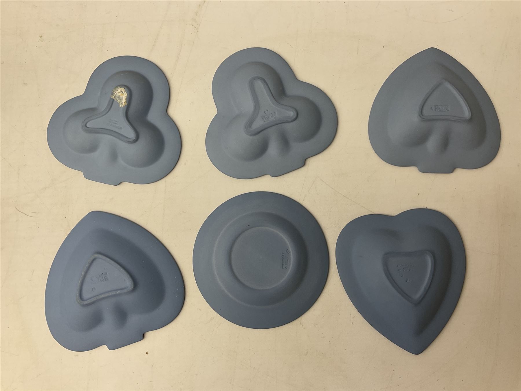 Wedgwood pale blue Jasperware, to include a pair of tulip vases, large vase with fluted rim, trinket dishes, trinket box etc, together with Wedgwood miniature hanging decoration in the form of a tea set 