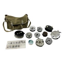 Fishing tackle, including 'The Gnat' fly reel, Alvey 4 1/2 inch reel, Paramount 4 1/2 inch reel, other fishing reels, various fishing flies and other similar items in a carry bag 