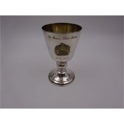 Modern limited edition silver goblet, commemorating Queen Elizabeth II silver jubilee, of plain form with gilded interior, applied Royal coat of arms to body and engraved 'The Queen's Silver Jubilee 1952-1977' upon knopped stem and circular spreading foot, limited edition no. 320/1000, hallmarked A T Cannon Ltd, Sheffield 1977, boxed with certificate, goblet H12.8cm