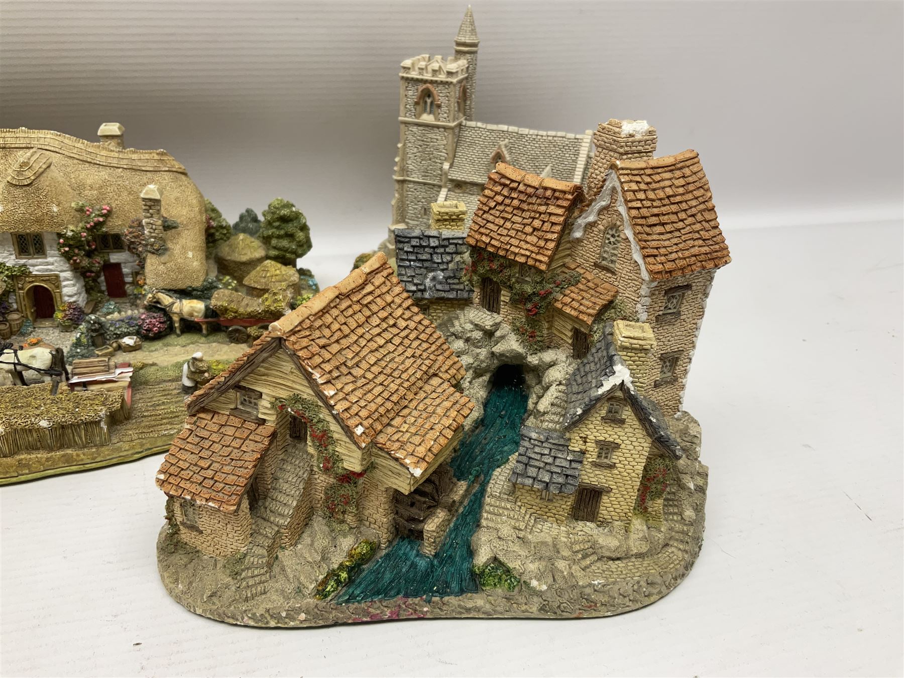 Twenty six Lilliput Lane models, to include Golden Harvest, Junk and Disorderley, Heaven Lea Cottage, Old Scrumpy Farm, Chantry Chapel Wakefield, etc, together with four similar cottages