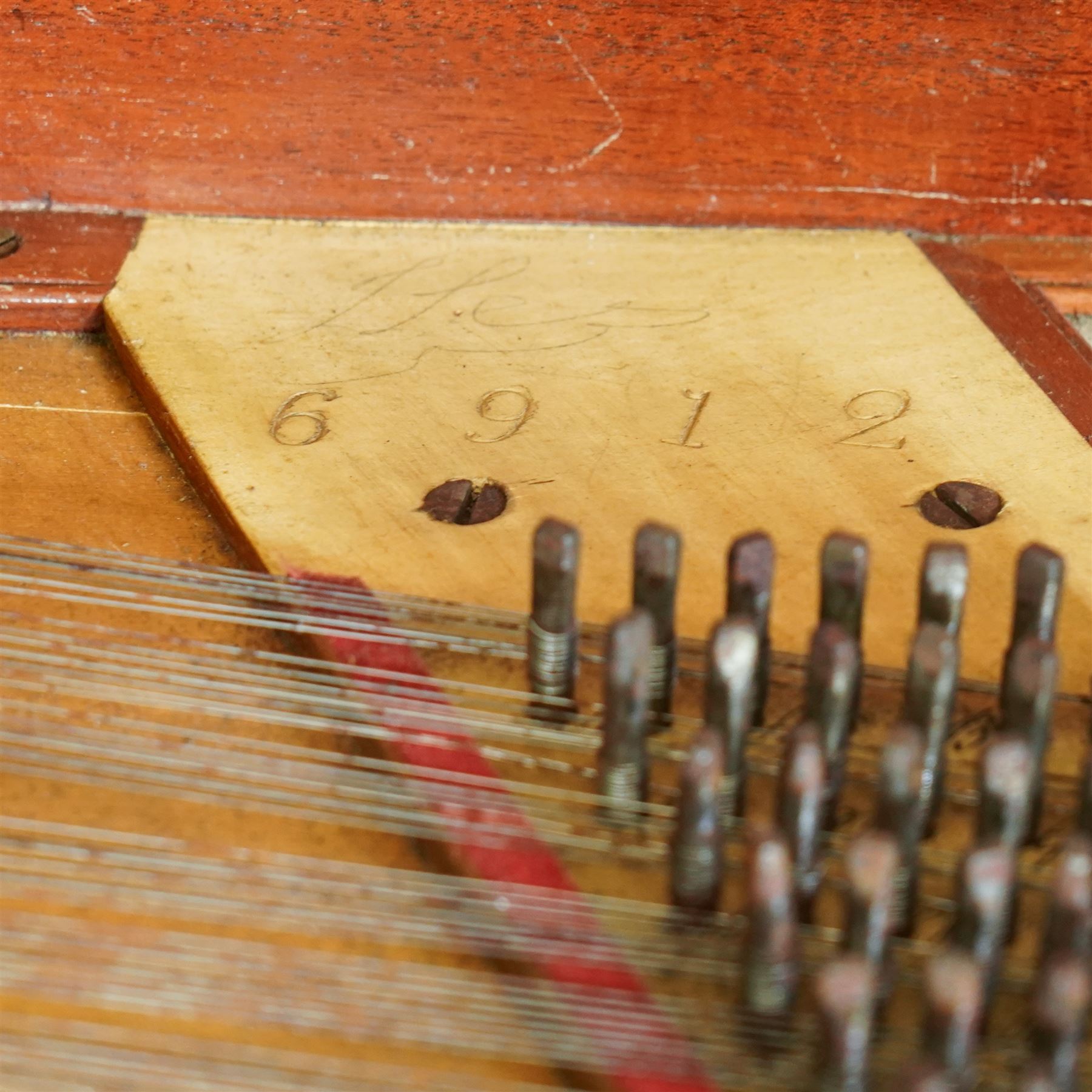 Early 19th century George IV Square Piano by William Rolfe & Co, 112 Cheapside, London, c1821. Mahogany veneered case with rosewood crossbanding and brass stringing, with sustain pedal and reeded legs on a tapered spiral with brass capitals, with three music draws beneath and a folding duet music stand, nameboard with makers name on a round gilt medallion and open silk backed fretwork to the ends, serial No 6699, double strung, English double action with 68 ivory and ebony keys, F1-C7. original strings, hammers and dampers, soundboard and bridge in good condition, with original makers written instructions on regulating the action and tuning the piano attached to the inside of the instrument. In good condition, however the action is in need of regulation and tuning.
William Rolfe is thought to have been in business between 1785 and 1828. 
Given the intricate nature of these historic instruments, specialist support will be available if required, to assist successful buyers with safe removal and onward handling. Price upon application.


This item has been registered for sale under section 10 of the APHA Ivory Act Reference PB6GL6SZ