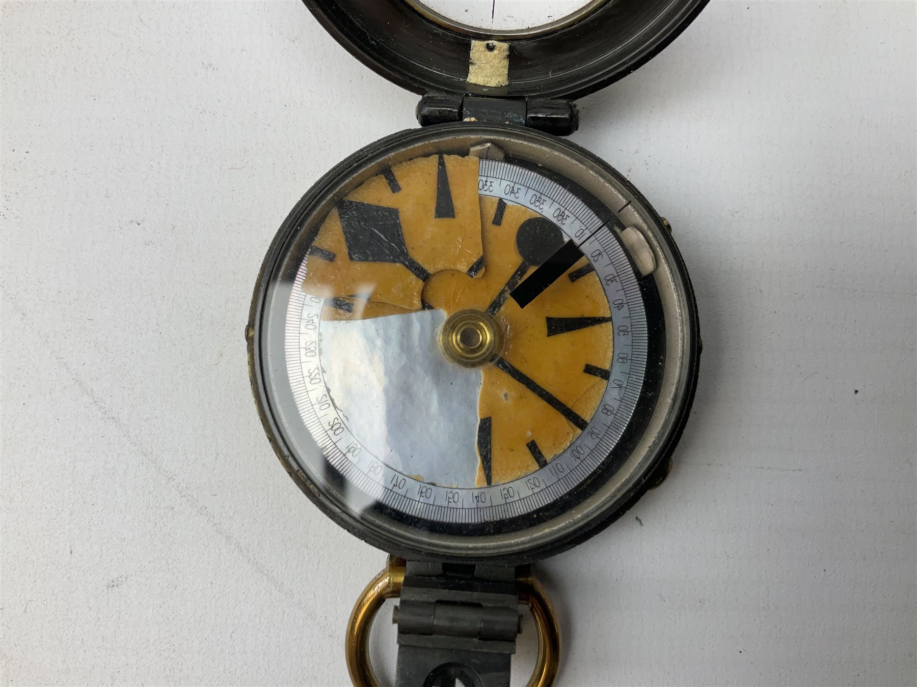 Two WW1 verniers pattern marching compasses, one dated 1917 in leather case impressed French & Son with manuscript details Major I.R. Edwards Mon. Regt., the other inscribed J.H. Steward 1903 in leather case with manuscript details G.L. Stirling Barnsley; four WW1 linen backed folding maps of Palestine and Telfit; another WW2 map of Swansea and Aberdare; and quantity of military and other postcards