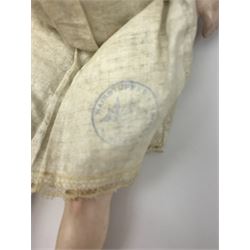 Early 20th century Cuno and Otto Dressel wax shoulder head doll with applied hair and fixed glass eyes, soft body with jointed composition lower limbs, maker's stamp to right thigh, clothing and box H38cm in original box