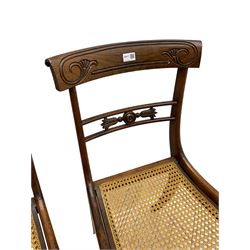 Pair of Regency rosewood framed side chairs, carved back rails over cane seat, raised on reeded supports (W46cm D50cm H84cm); set of three Edwardian walnut cane seat bedroom chairs, carved shield back (W41cm H88cm)