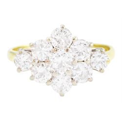 18ct gold diamond cluster ring, nine round brilliant cut diamonds, in a marquise shaped se...