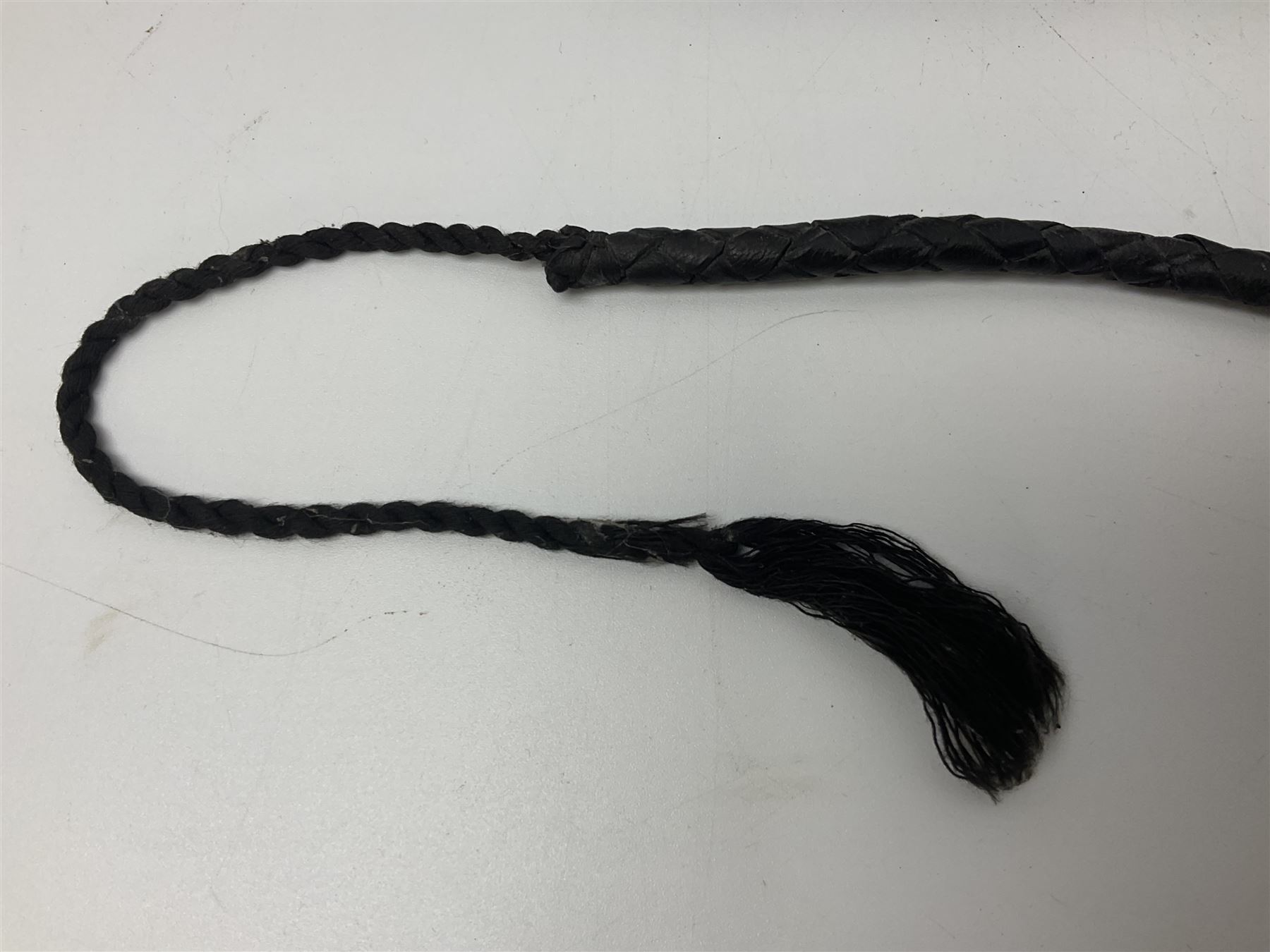 Near pair of short swords each with slightly curving 41cm fullered steel blade and all brass H-shaped hilt L52cm overall; plaited black leather whip; and reproduction pair of brass hilted swords, brass halberd blade and mace (7)