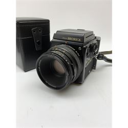 'Zenza Bronica SQ-B' camera fitted with 'Zenza Bronica Zenzanon-PS 1:28 f=80mm' lens, 'Zenza Bronica Zenzanon-PS 1:4 f=150mm' lens and 'Zenza Bronica Zenzanon-S 1:35 f=50mm' lens, with an instruction booklet