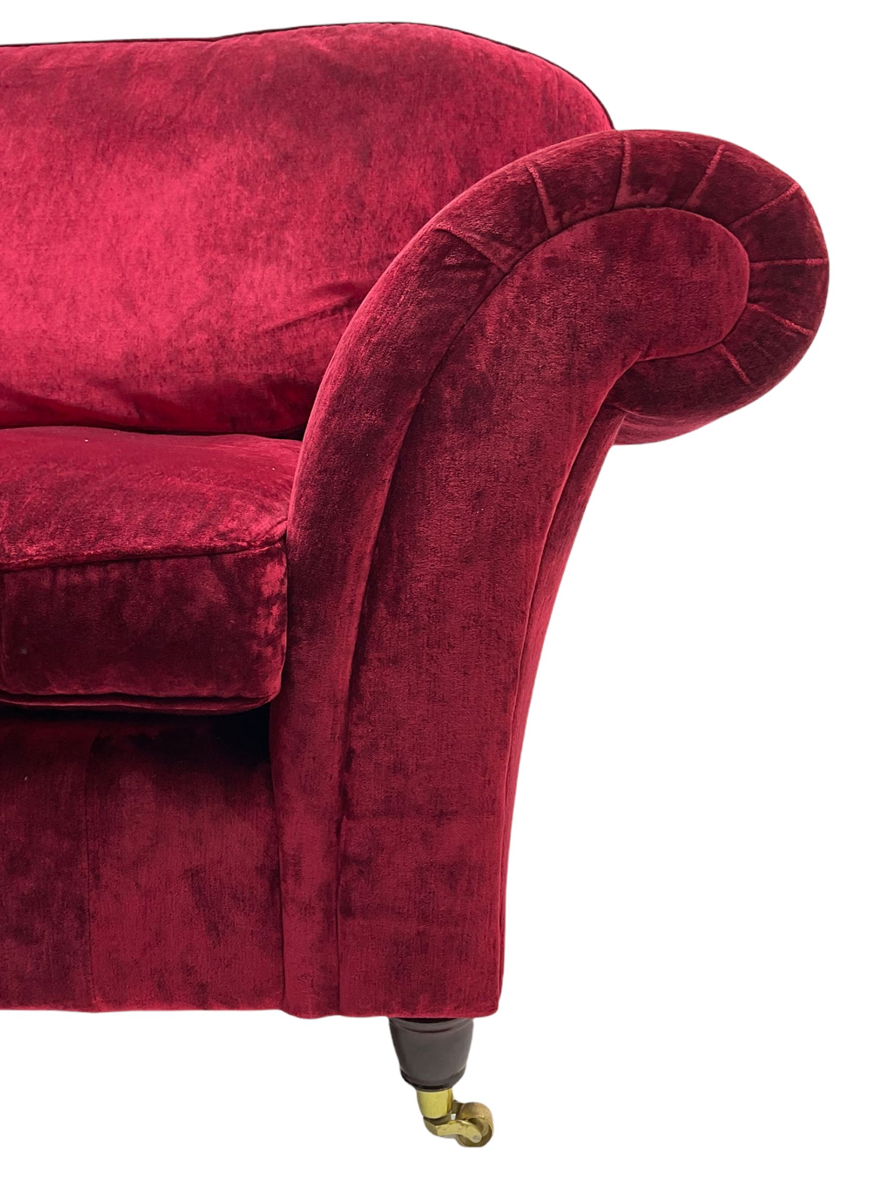 Laura Ashley - traditional shaped three seat sofa (W225cm, D95cm), and matching two seat sofa (W182cm), upholstered in crushed red velvet fabric 