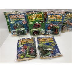 Eighteen issues of Tractors and The World of Farming magazine, together with sixty diecast tractors, all in original packaging, in three boxes 