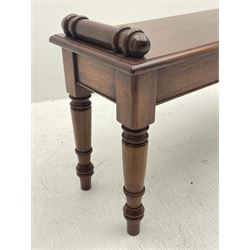 Victorian style mahogany window seat, the moulded rectangular top set with two turned mounts, plain frieze stretchers, on turned supports