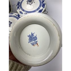 Booths and Cauldon matched tea and dinner wares decorated with blue dragons upon a plain ground heightened with gilt