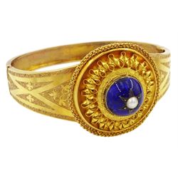 Victorian 18ct gold enamel and seed pearl hinged bangle and matching brooch, each star set with a seed pearl and blue enamel dome within a circular cannetille frame, each with a glazed panel verso, the hinged bangle with foliate engraved decoration, in fitted case