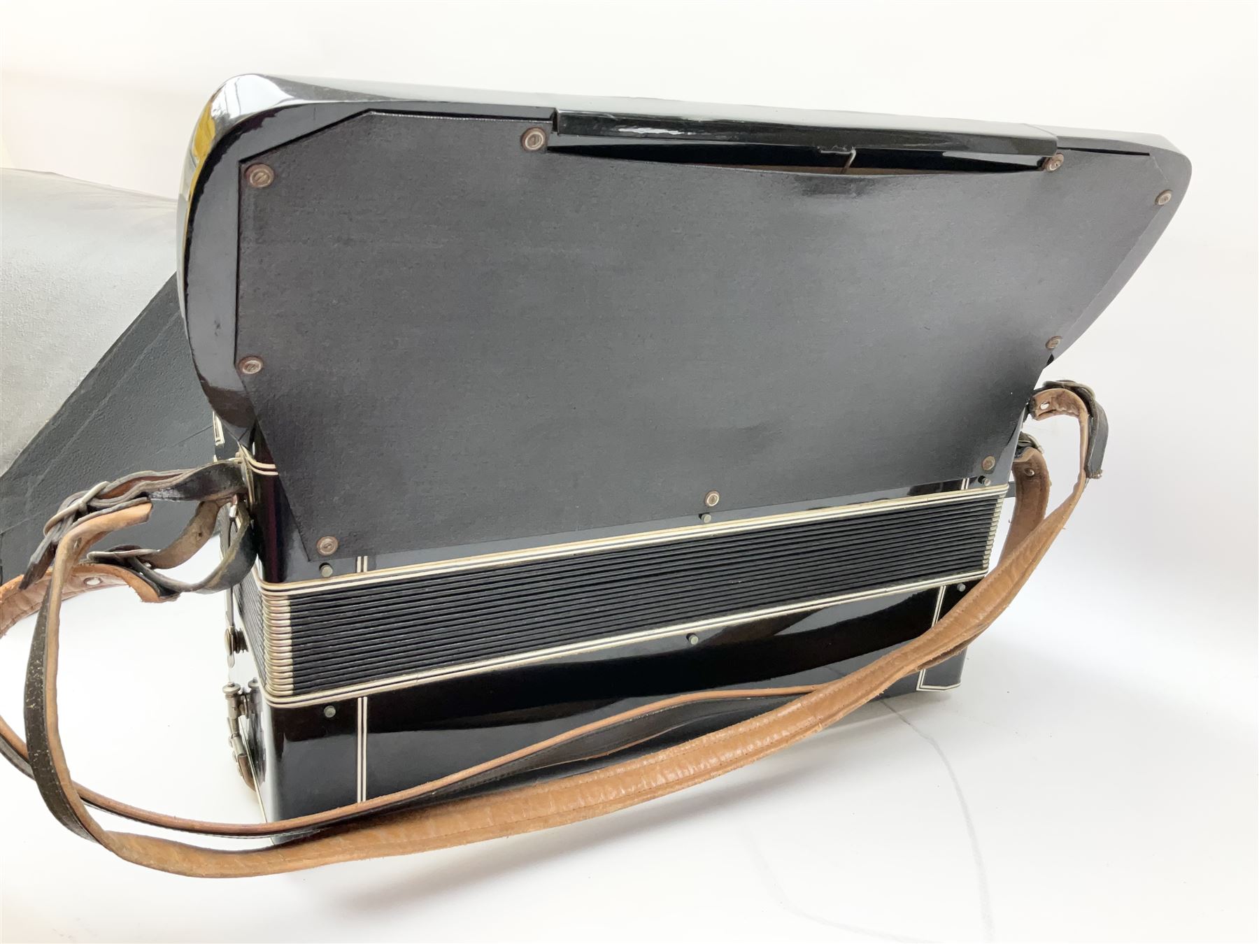 Italian Mantovani piano accordion with Art Deco style black and white case, twenty-four keys and one-hundred and twenty buttons L52cm in carrying case