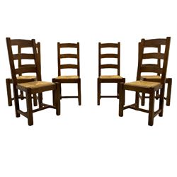 Antix French oak dining table with two leaves, two frieze drawers;, and six ladder back chairs with rush seats